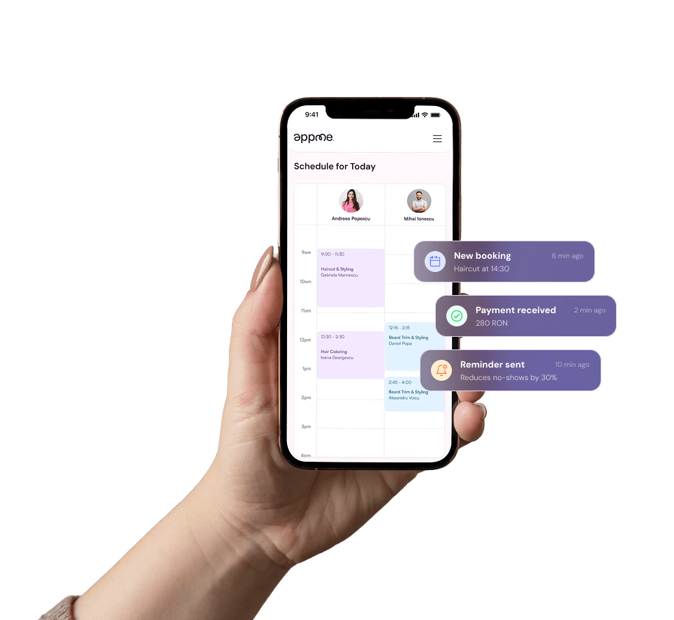 Hand holding smartphone with AppMe business app showing schedule and notifications
